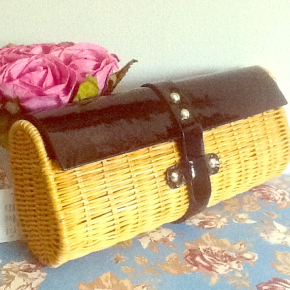 BNWT J. crew Straw clutch w/ black leather trim.