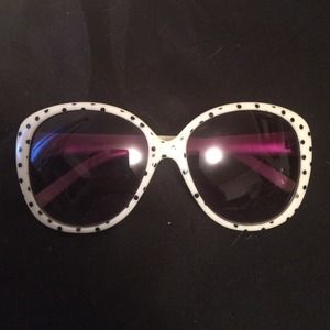 white sunglasses with black polka dots