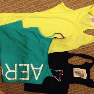 Three large tank tops