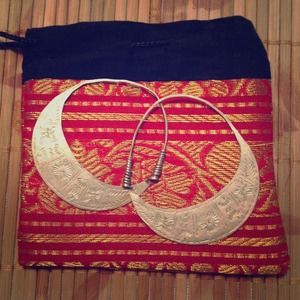 Large silver hoop earrings, tribal print