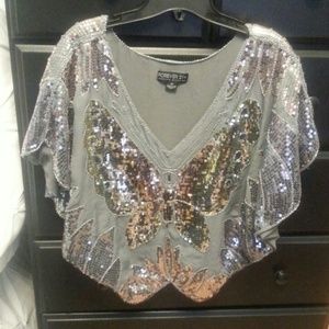 SOLD A great sparkly poncho from forever21.