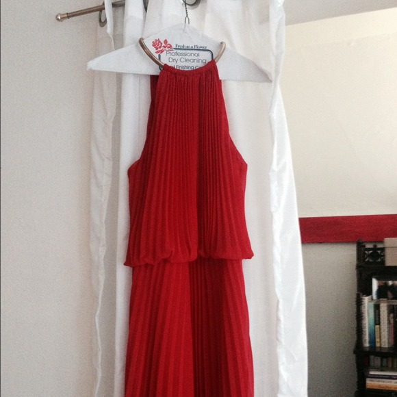 Red pleated evening dress