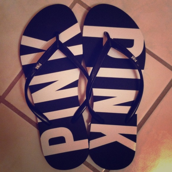 Victoria's Secret navy and white flip flops
