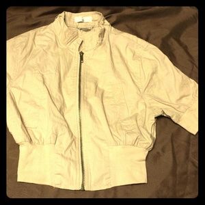 Beige color half zip up light jacket
