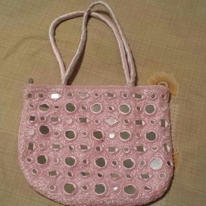 Pink mirror purse