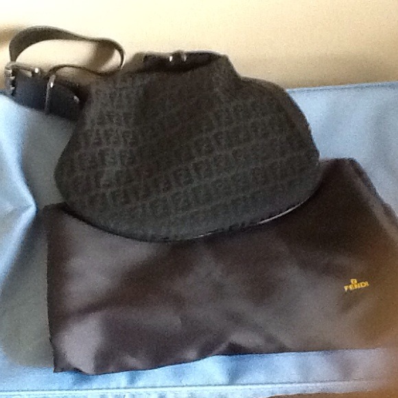 Handbag this is a smalltalk bag with dustbag,