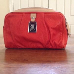 Darling Orange leather clutch JUST REDUCED!