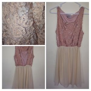 A light pink and tan sequin dress