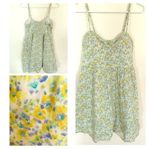 A yellow, blue, green, and white dress