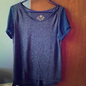 Dark blue shirt , see through sleeves
