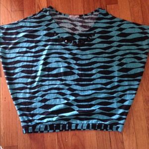 Teal & black shirt.