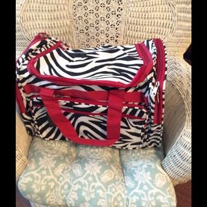Zebra stripe print overnight bag. Great quality.
