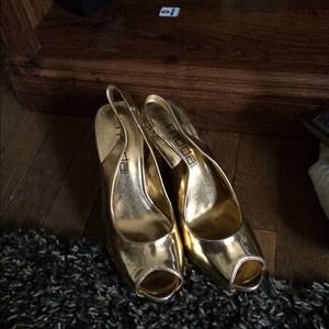Gold metallic open toed pumps