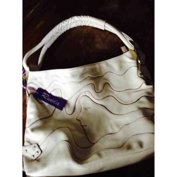 Large brand new cream colored purse