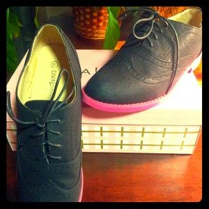 Brand new black Oxfords with pink sole
