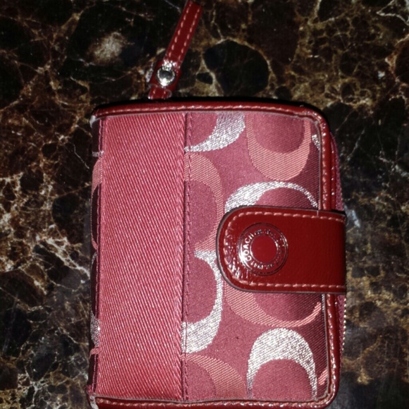 Dark burgundy coach wallet, barely used.