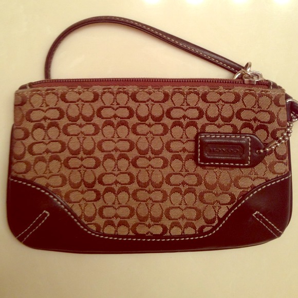 Authentic older style coach wristlet!