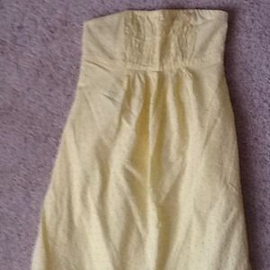 Yellow dress with pink stitching