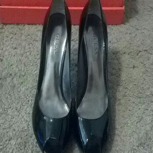 All black guess heels.