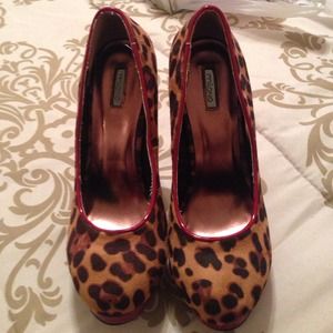 Red and cheetah print high pumps