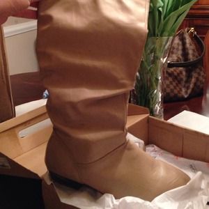 New size 10 boots knee-high in nude