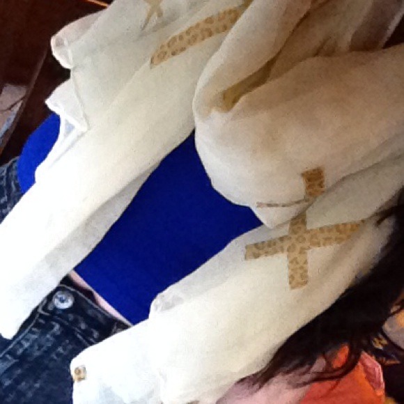 Gorgeous scarf with leopard print crosses.