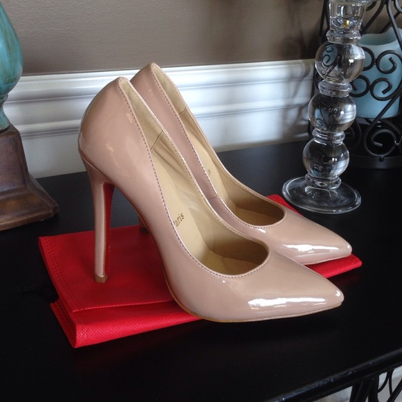 REDUCED !!!!!  Designer Nude red bottom pumps