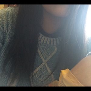 Selling Blue sweater with a very cute design.