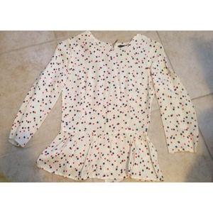 Polka-dot peplum blouse