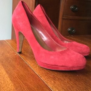 Red suede pumps
