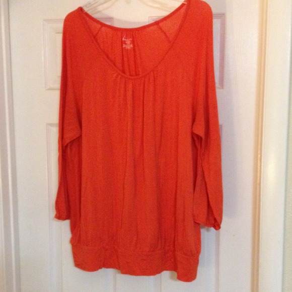 SOLD. Coral banded bottom blouse