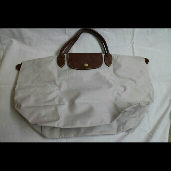 Long champ small handle Le Pliage white