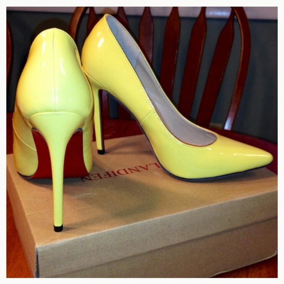 Yellow pointed toe red bottoms