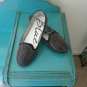Black studded flat shoes