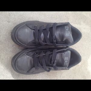 All black leather chuck Taylor (converse)