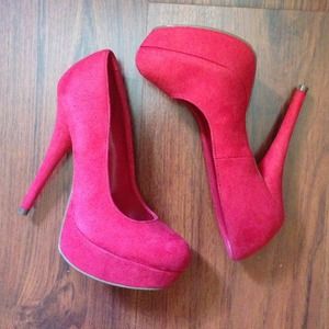 Red platform pumps size 5.