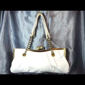 White Aldo leather bagette. 11"x5" Strap: 10"