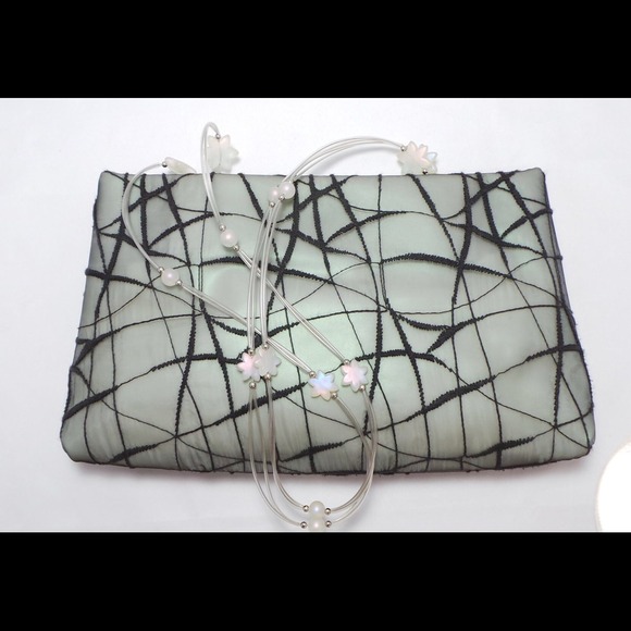 Pale moss clutch/handbag. 10x7 inches NWOT