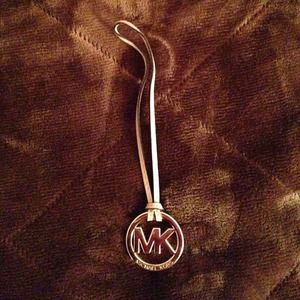 Authentic Michael Kors medallion