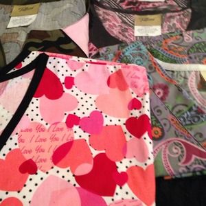 I have 8 Floral Scrub Tops, size 3x.