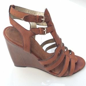 Pre-loved Nine West leather gladiator wedge.