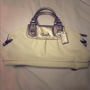 Coach and Dooney & Bourke purses/wallets.