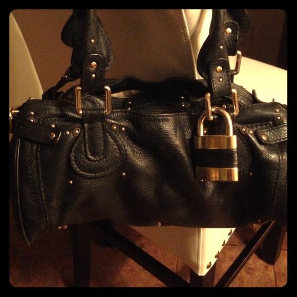 Very well loved Chloe Paddington bag in black.
