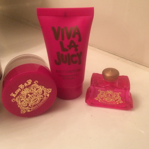 Travel sized perfume, shower gel and body creme