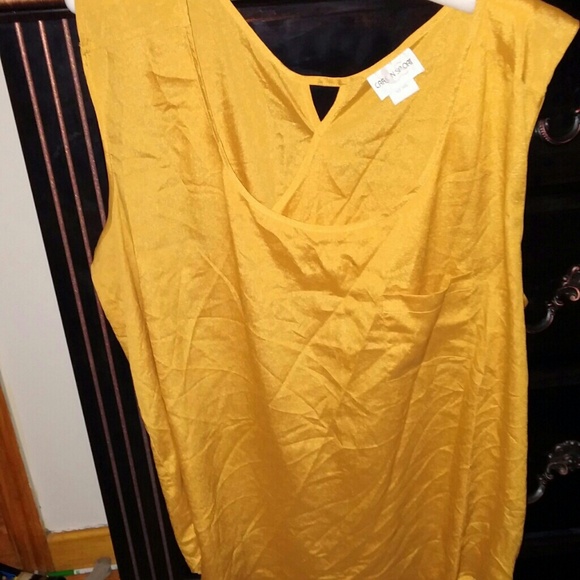 Gold blouse opens in the back