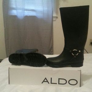 Leather Aldo rain boots.