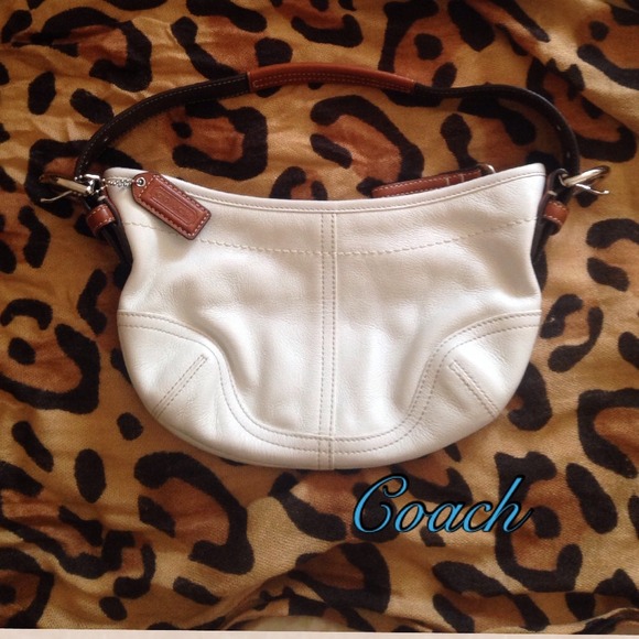 Small leather coach bag .