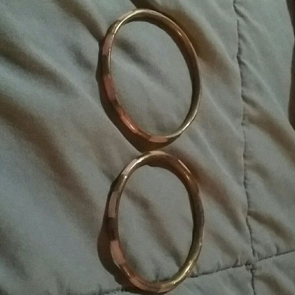 Two pink and brown bangles