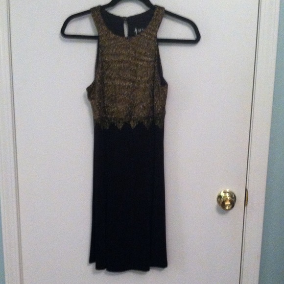 Black dress with gold embellished top