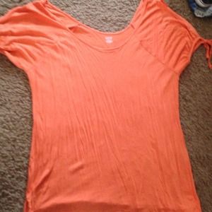 Beautiful orange cold shoulder top.
